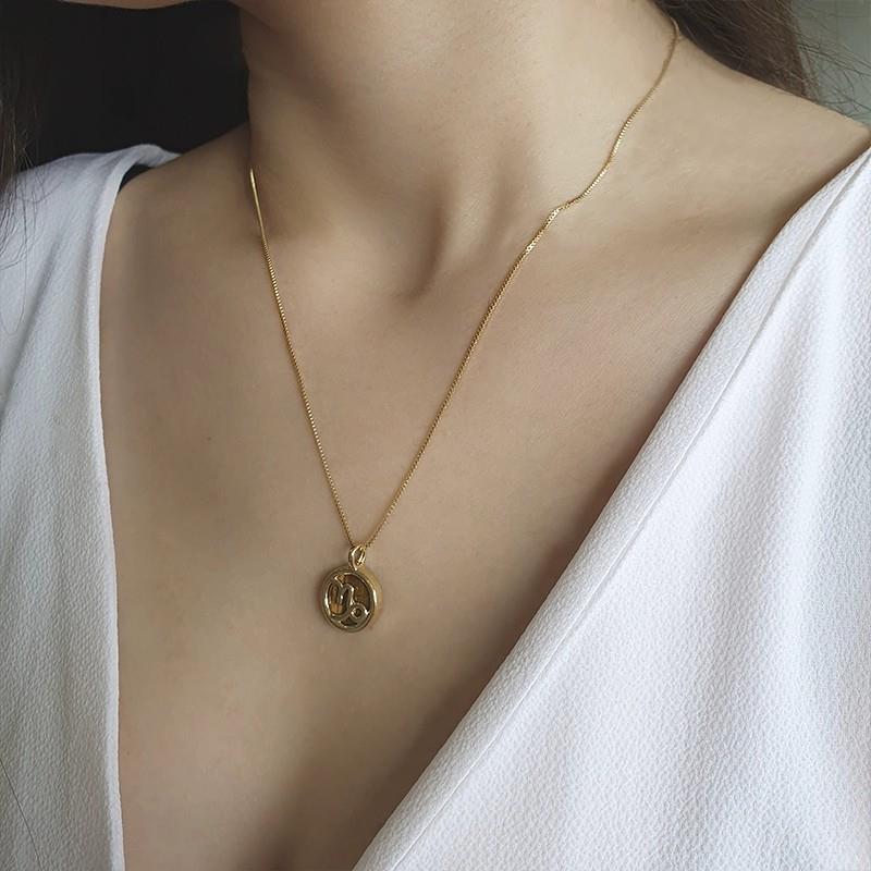 PINGENTE CAPRICÓRNIO FOLHEADO A OURO 