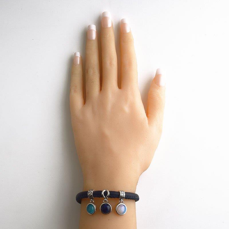 PULSEIRA DE COURO AZUL MARINHO FOLHEADO A PRATA ENVELHECIDA